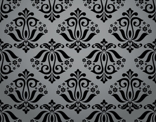 Wallpaper in the style of Baroque. Seamless vector background. Gray and black floral ornament. Graphic pattern for fabric, wallpaper, packaging. Ornate Damask flower ornament.