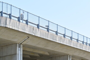 Elevated road fence and guardrail.