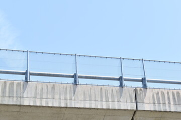 Elevated road fence and guardrail.