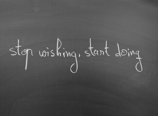 Stop wishing, start doing sign written on a chalkboard