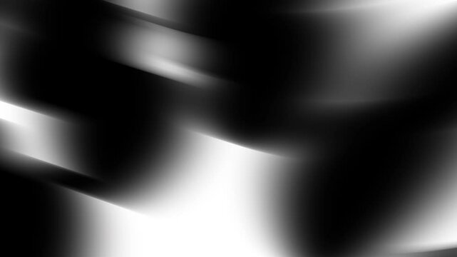 Grayscale abstract art with smooth curves blending black white shades. Suitable for backgrounds, book covers, websites, and modern designs.