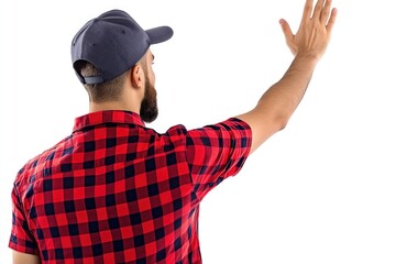 Naklejka premium A person waving with enthusiasm wearing a distinctive red and black checkered shirt