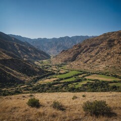 Obraz premium A valley under a clear blue sky at noon.