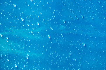 Droplets with blue color background suitable for wallpaper