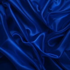 Fototapeta premium Zafiro oscuro y textura satinada azul real. Pliegues de cortinas brillantes. Fondo abstracto con brillo sutil