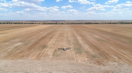 Obraz premium Aerial View of Agricultural Field in Australia: Drone Photography of Harvested Wheat Crop