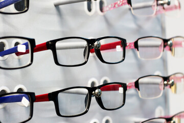 Glasses with diopters in an optics store on a stand