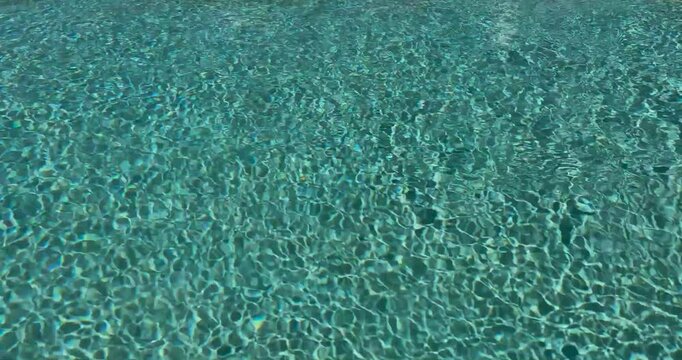Ripples of water in a swimming pool.