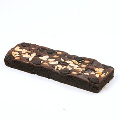 Delicious chocolate brownie features almond slices and cookie chunks, perfect for satisfying sweet cravings at any time