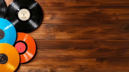 Fototapeta premium Colorful Vinyl Records on Rustic Wooden Background Perfect for Music or Nostalgia Themes