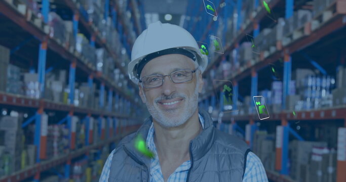 Image of eco icons and data processing over caucasian man working in warehouse