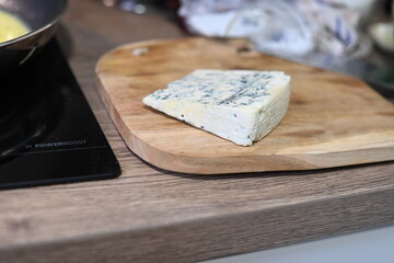cheese on a wooden board
