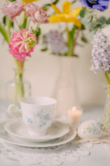 Elegant Breakfast Table Setting with Spring Flowers in Soft Tones