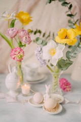 Elegant Breakfast Table Setting with Spring Flowers in Soft Tones