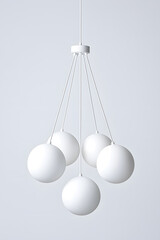 Modern chandelier with a cluster of hanging white glass orbs isolated on white background
