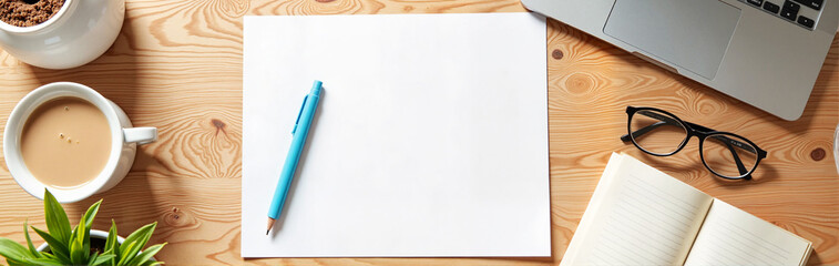 A4 Paper Mockup with Laptop on a Wooden Table