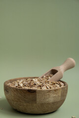 Raw oatmeal porridge Gluten free cereals. Health gut benefits. Concept of alternative whole spelt grain ingredient. Vegetarian diet recipes. Plant-based lifestyle. Copy space Protein rich eating 