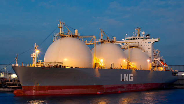 Stern port side view of an LNG carrier moving along the strait.