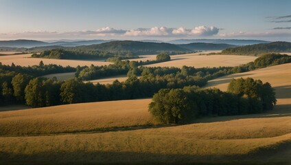 Fototapeta premium Misty sunrise over rolling hills