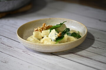 Homemade Potato Gnocchi with Spinach, Blue Cheese, and Walnuts – Creamy Sauce