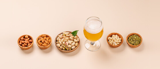 A vibrant assortment of various nuts and beer
