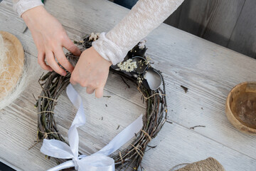 Step by step instruction of making handmade Easter wreath made of sustainable materials decorations...