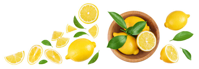 Ripe lemon with slices in wooden bowl isolated on white background. Top view with copy space for your text. Flat lay