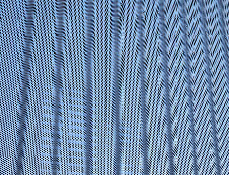 building is lined with square panels. metal sheet wall cladding with scalloped design. corrugated sheet, dark gray, riveted. horizontal stripes, shadows, corner, fence, aluminium, sheet, hotel
terrace - Powered by Adobe