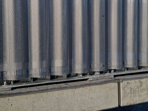 building is lined with square panels. metal sheet wall cladding with scalloped design. corrugated sheet, dark gray, riveted. horizontal stripes, shadows, corner, fence, aluminium, sheet, hotel
terrace - Powered by Adobe