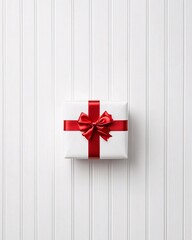 Fototapeta premium Wrapped gift with red ribbon