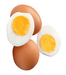 Top view of two raw chicken eggs and peeled cooked or boiled egg with egg yolk in two halves in stack isolated on white background with clipping path