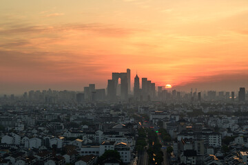 sunset over the city in suzhou china