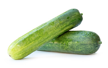Side view of two long green cucumbers in stack and cross shape in horizon isolated on white background with clipping path