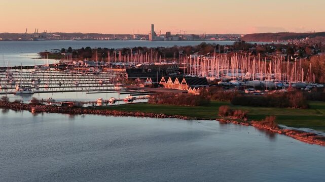 Aerial golden hour view of Egaa Harbor and Aarhus, Denmark