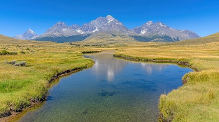 Fototapeta premium Mountain range reflection in calm river, sunny day, grassland. Use travel brochure
