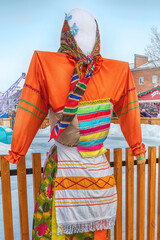 Russian traditions. Russian holiday Maslenitsa. Pancake week. Pancake week figurine close-up.