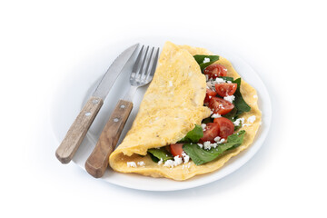 Stuffed omelette with tomatoes and spinach isolated on white background.