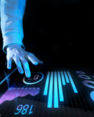 Person in light-colored sleeve interacting with advanced digital touch screen displaying bar charts, analytics, and futuristic financial data. Concept of business, technologies, data, engineering. Ad