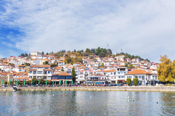 Fototapeta premium Picturesque view of Ohrid, North Macedonia, a historic town on Lake Ohrid shore, known for its charming architecture and stunning lake views, making it a popular tourist destination.