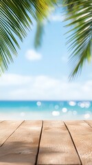 Wooden table with beach view featuring seascape and palm leaves on a sunny day by the ocean