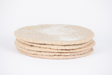 stack of flat breads on a white background