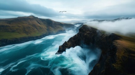 Dramatic cliffs and crashing waves create a stunning view in a coastal landscape during overcast weather