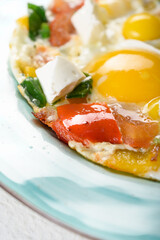 delicious scrambled eggs for breakfast in a plate