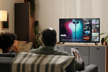 Watching TV Show in Cozy Living Room Setting