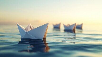 Paper boats sailing sunset sea; teamwork concept