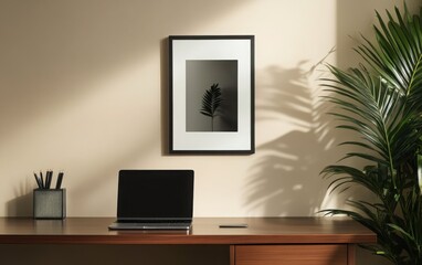 Fototapeta premium A sleek minimalist office with a dark wood desk, a slim laptop, and a metal desk organizer. The backdrop features light beige walls, a large floor plant in the corner