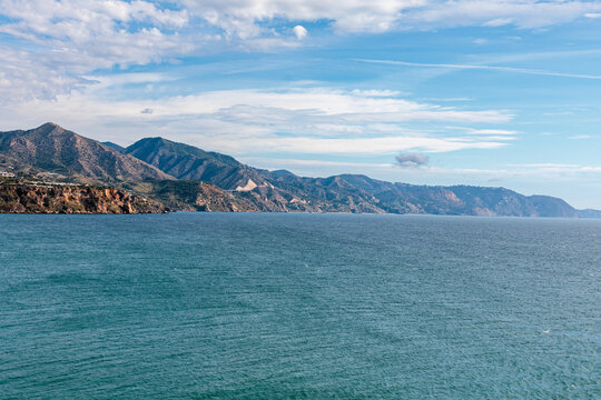 Scenic coastal landscape with majestic mountains