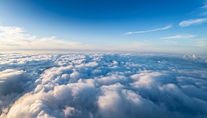 Fototapeta premium 広がる雲海の上空からの視点、無限に広がる白い雲