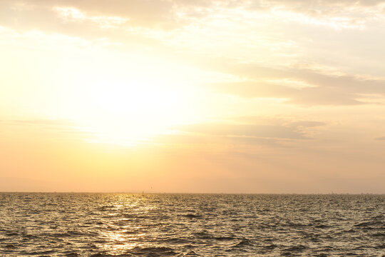 nature sea scape dusk evening sunset background landscape idyllic simple wavy water horizon panorama wallpaper landscape concept photo