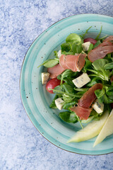 tasty and healthy salads in a plate on a beautiful background